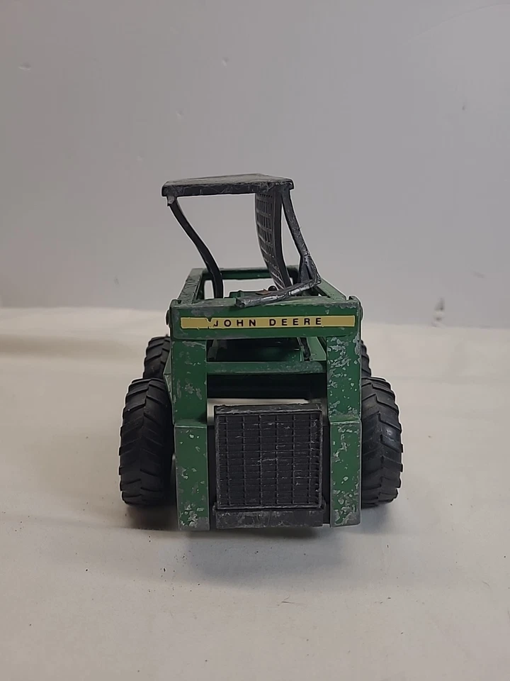 Minicargadora ETRL John Deere verde con cabina negra, caja de arena especial Foto 4 de 4
