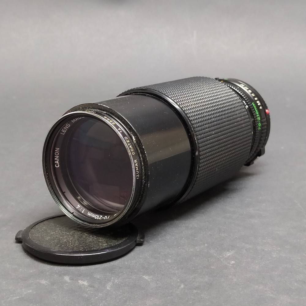 Zoom fotografico Canon FD 70-210 mm 1:4 con filtro Izumar coated 1A 58 mm