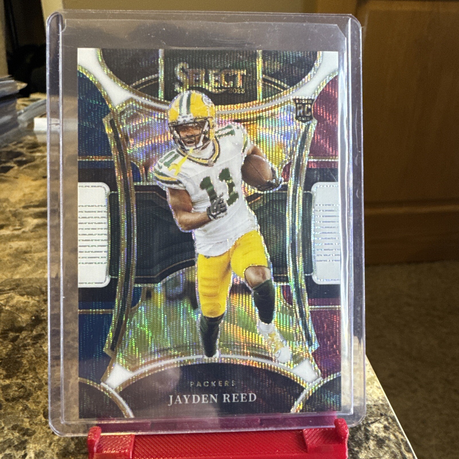 2023 Panini Select - Suite Level Tri-Color Prizm #434 Jayden Reed /149 (RC)