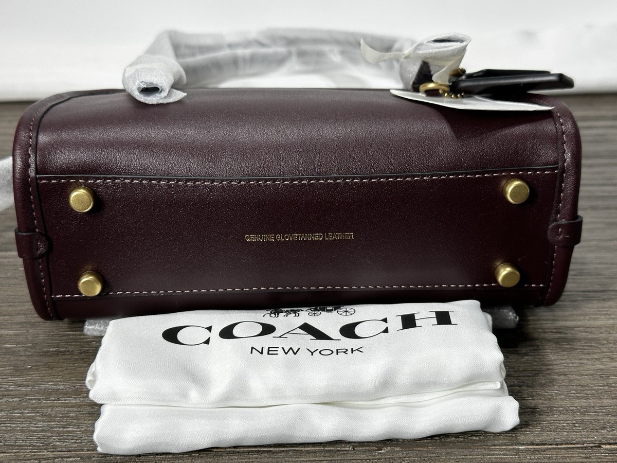 Coach Swing Zip Bag 20 in Black Currant Glovetanned Leather CAM45