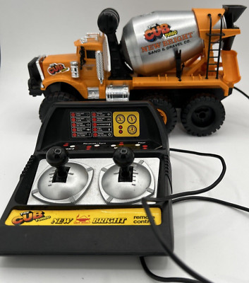 1987 New Bright Battery-Operated Remote Control the Cub Cement