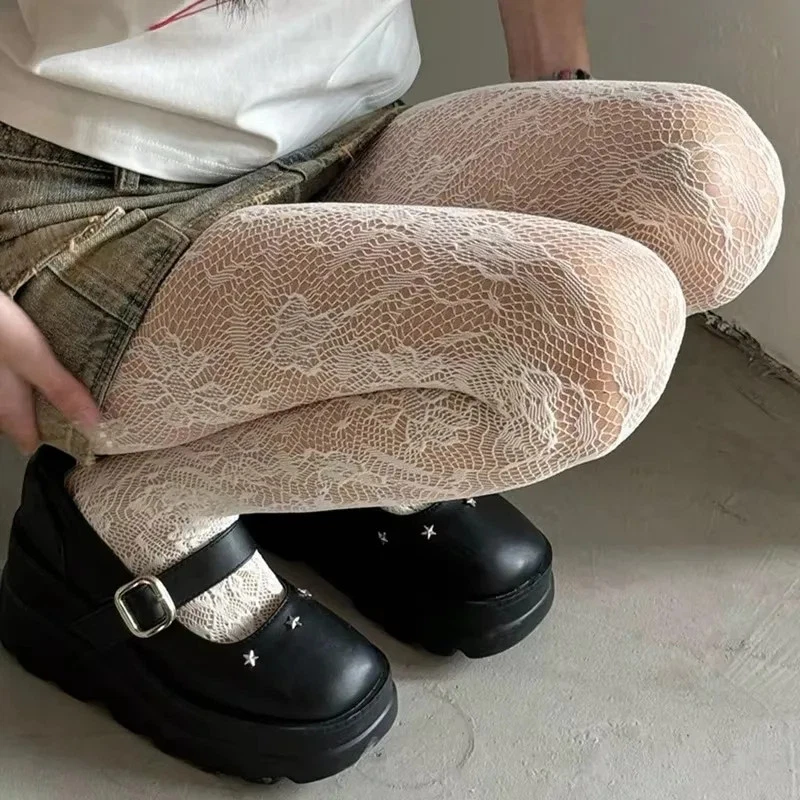 Medias de muslo de seda transparente huecas de malla floral bordadas de encaje de nailon para mujer Foto 3 de 4