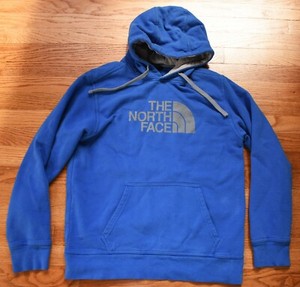 blue north face sweatshirt