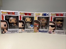 Rare and Retired WWE POP Set of 4 , Roman Reigns, Seth , Warrior And Bret Heart