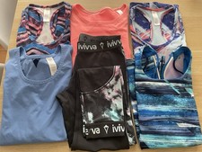 New Iviva By Lulumon Age 12 Stretch Sports Wear. Blue/ Orange Top Is Age 14