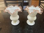Fenton Milk Glass Pink Rose Crest Ruffled Vases 6 3/4 “ tall and 5 3/4 “ wide.