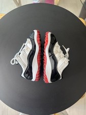 Jordan Kids Black, White, and Red Sneakers Size 7C