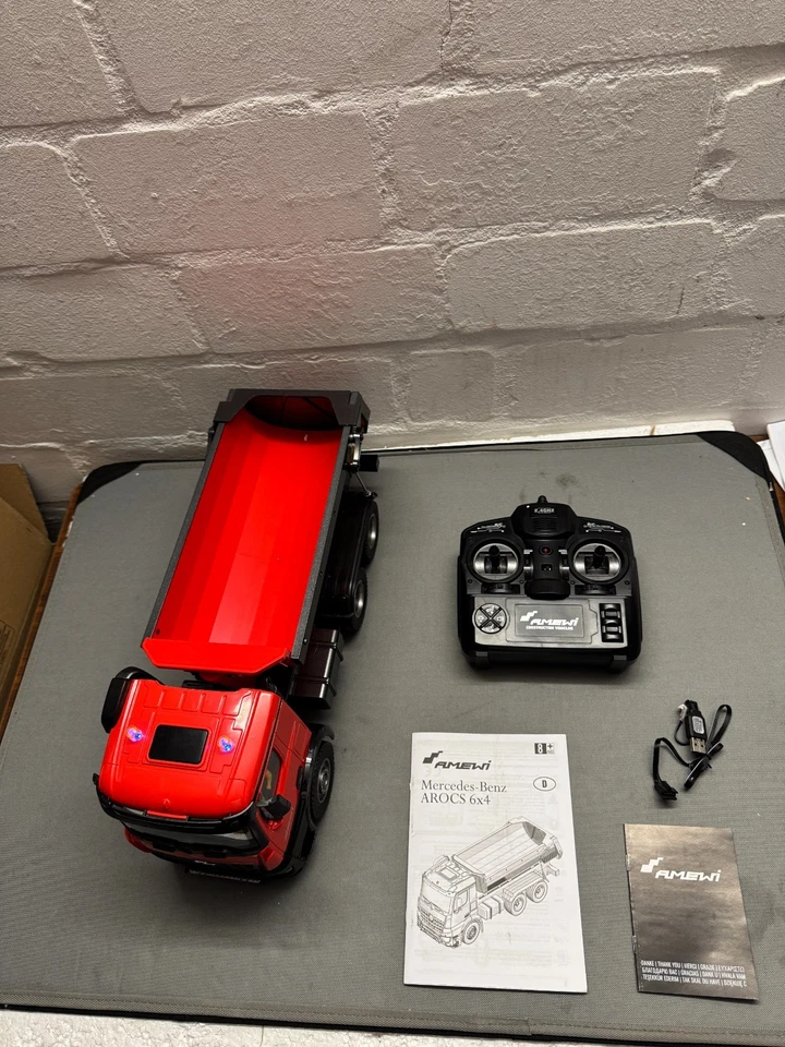 Amewi Mercedes-Benz Arocs Lizenz LKW Kipper 1:14 2,4GHz RTR rot - Bild 3 von 4