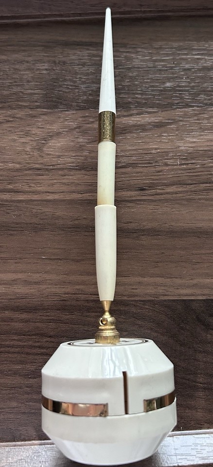 A USA-made mid-century pen and stand set with genuine elegant lines — the kind of desk piece that signals 'I have taste' without trying too hard.
