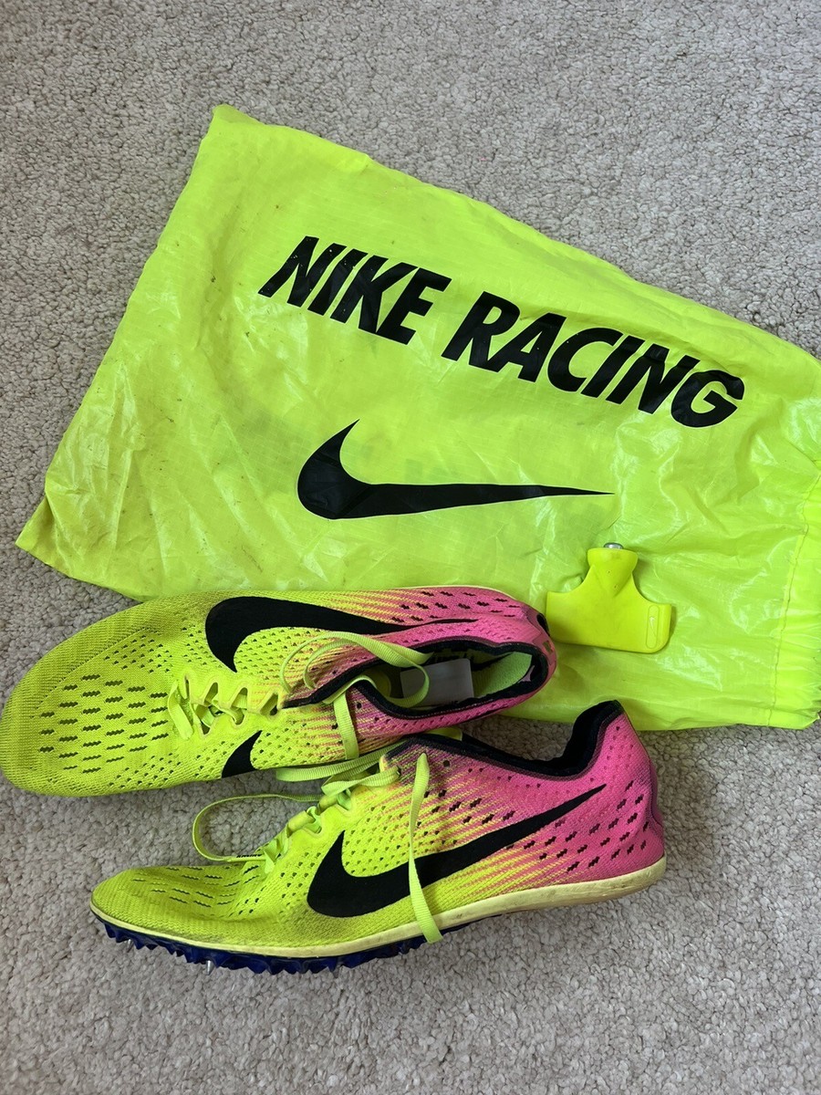 yellow and pink nike spikes