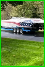 2001 Fountain Lighting Powerboat with Trailer