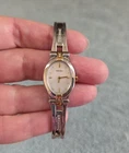 Vintage Seiko Ladies Watch 1N00-0KG0 R2 Silver Tone Band Gold Accents White Dial