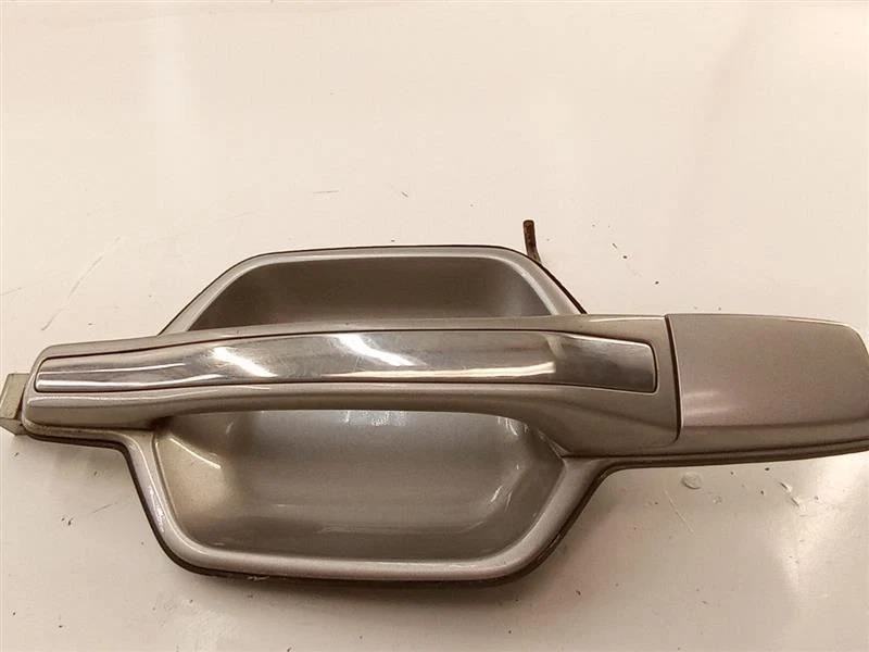 Manija de puerta exterior trasera izquierda conductor Mitsubishi Montero 2001-2006 OEM probado Foto 3 de 4