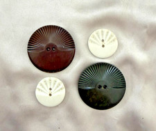 Lot of 4 Vintage Plastic Colt Buttons #251