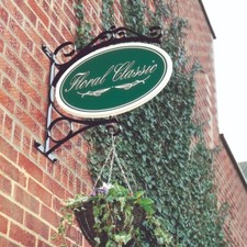 Traditional iron projecting sign