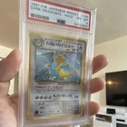 The Pokemon Company 1997 Dark Dragonite Rocket Gang 149 Holo Rare PSA 8 JP