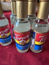 7 small 5 oz bottles Torani Original Vanilla Syrup, 150 ml 4/24/26