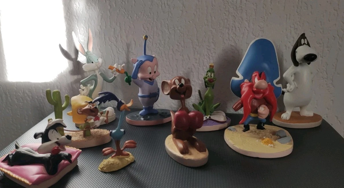 Tirelire bébé Taz TM & WARNER BROS livre figurine en résine 16 cm