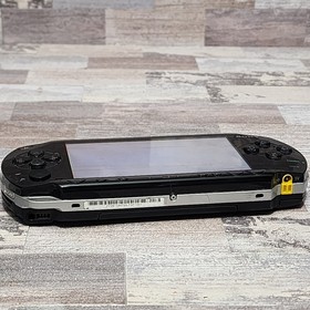 Sony PSP-1001 Console with Battery, Charger and 3 Games Bundle - USA