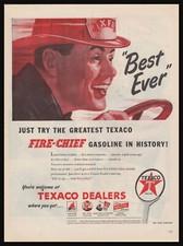 1947 TEXACO Grinning Firefighter Fireman  at Wheel of Fire Truck Engine PRINT AD
