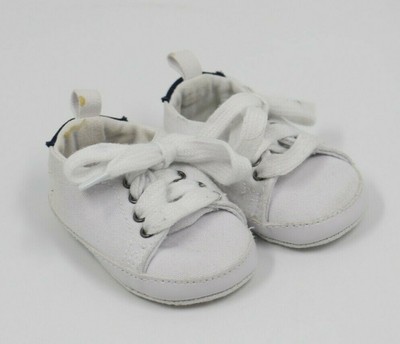 white canvas baby shoes