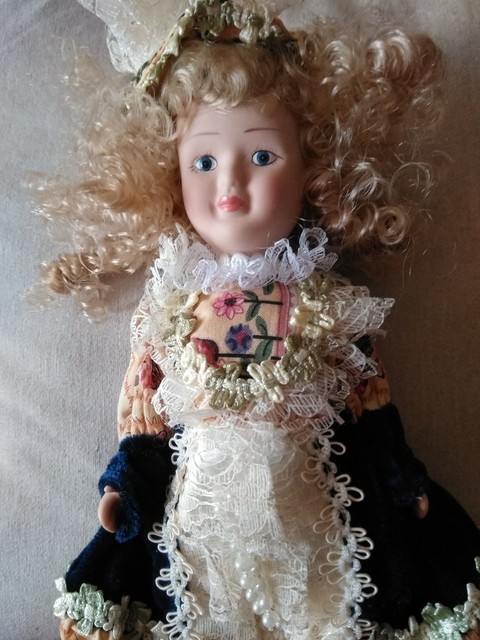 fotos de muñecas de porcelana