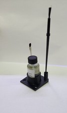 Flux bottle holder. Holds bottle and 2 brushes. 3D printed