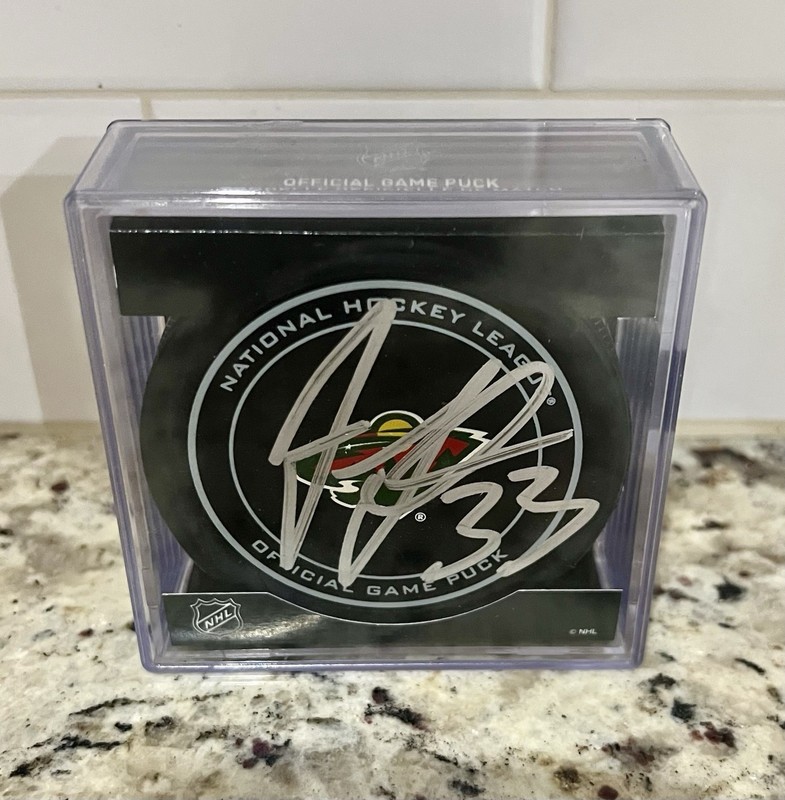 Minnesota Wild  Jordan Leopold Autographed NHL Official Game Puck