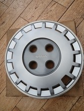 Nissan Bluebird SLX T12,14 Inch Genuine hub cap wheel trim,new in pack .