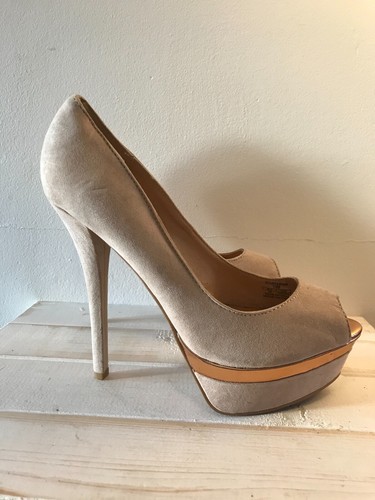 gold platform pumps