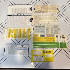 Lot of Vintage Slide Rule Calculators For Various Items From  Wiring , Fuel Oil