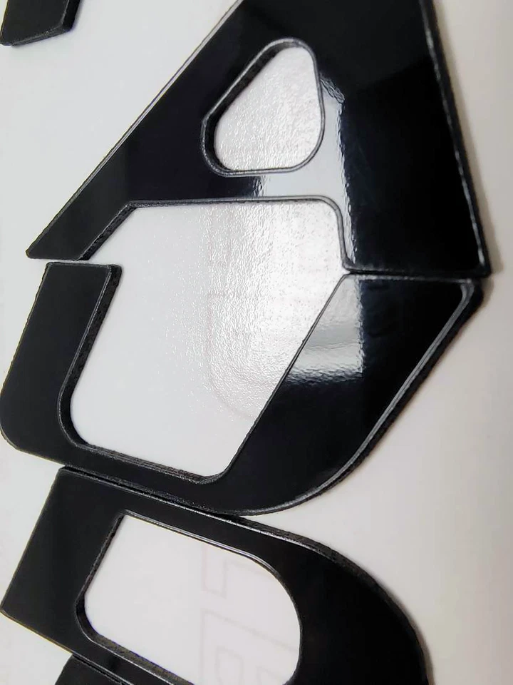 Inserciones de letras de plástico negro brillante para parachoques trasero para Mercury Marauder 2000-2004 Foto 2 de 2