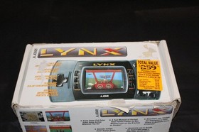 Atari Lynx 2 With 7 games and original box tested working Please read