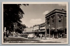 Postcard Florida RPPC DeFuniak Springs 1948 Cancel Street View Ritz Cars Bikes