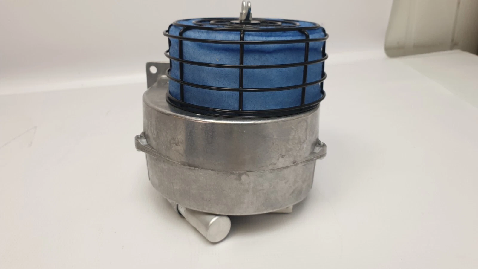 Rear of the aluminium blower housing with filter cage on top