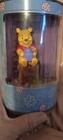 Winnie the Pooh 4" figurine w/ honey pot on tree stump in metal round tin Disney — photo 7
