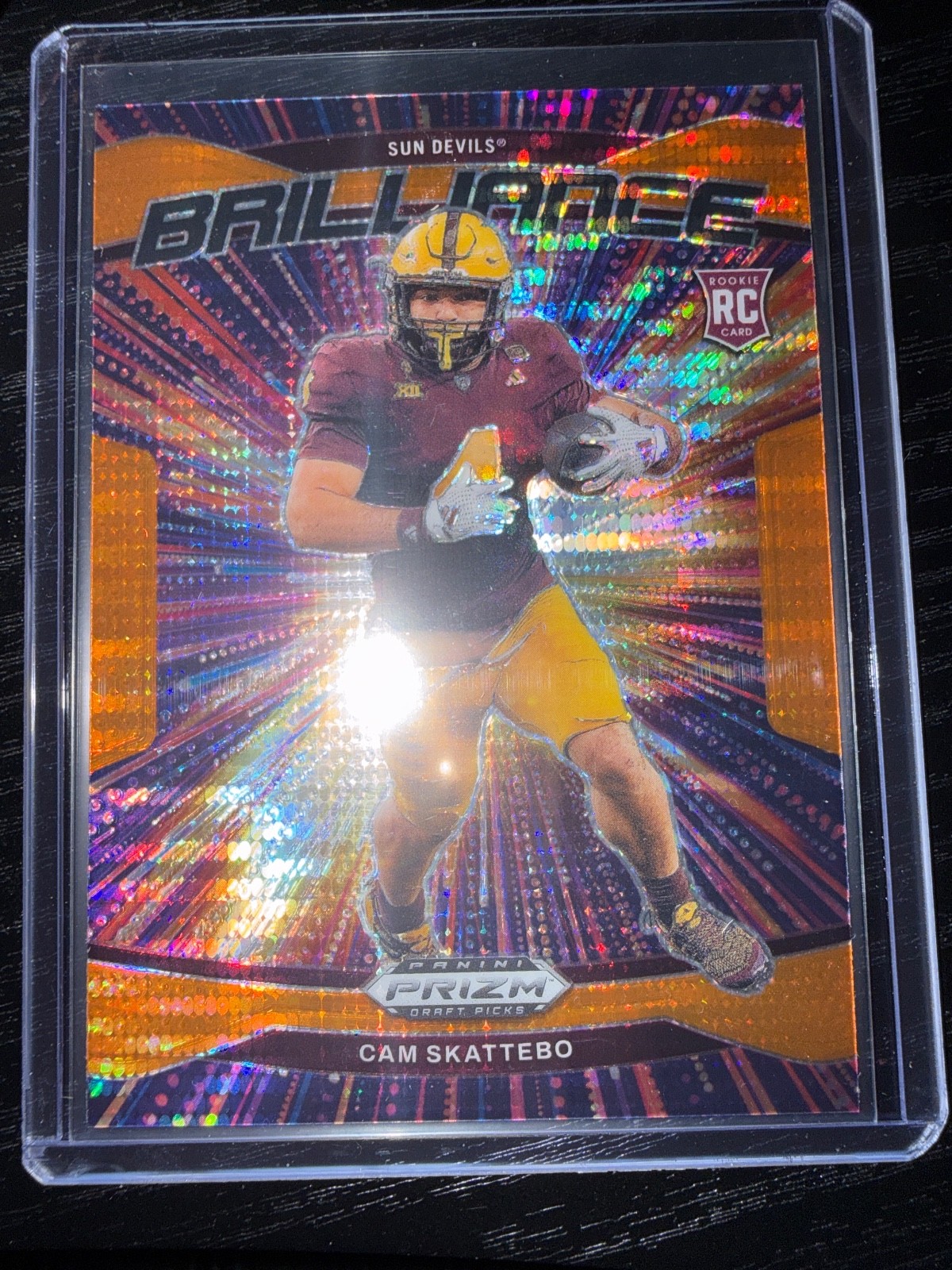 2025 Prizm Draft Picks Cam Skattebo RC Orange Pulsar Brilliance 27/75