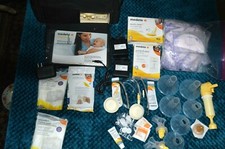 Madela Breast Pump portable on the go double electric with Lot accessories New