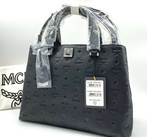 mcm essential tote in monogram leather
