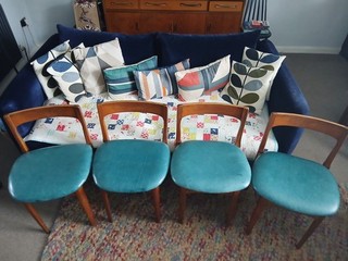 4 x Vintage teak chairs with faux leather seats