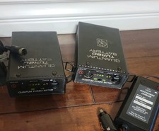 2 Quantum Turbo QTB Battery Pack with wall charger  auto charger. Used. Works.