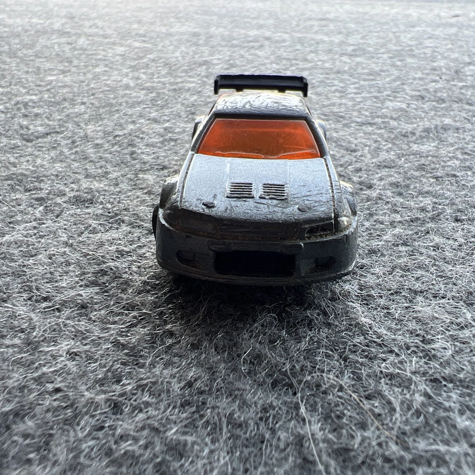 Protector Hot Wheels 2010 Mystery Pack cromo naranja Nissan Skyline GT-R (R32) Foto 3 de 4