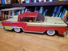 NICE  RED ET  TIN LITHO  FRICTION POWERED  1959 FORD FAIRLANE 500