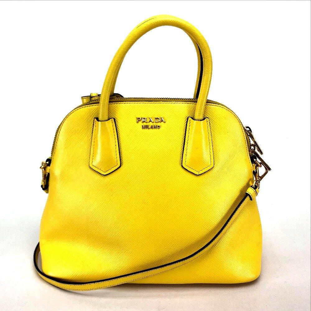 Prada Yellow Handbags