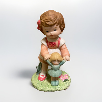 Hand Painted Ceramic Girl Figurine with Doll, Multicolor People Theme