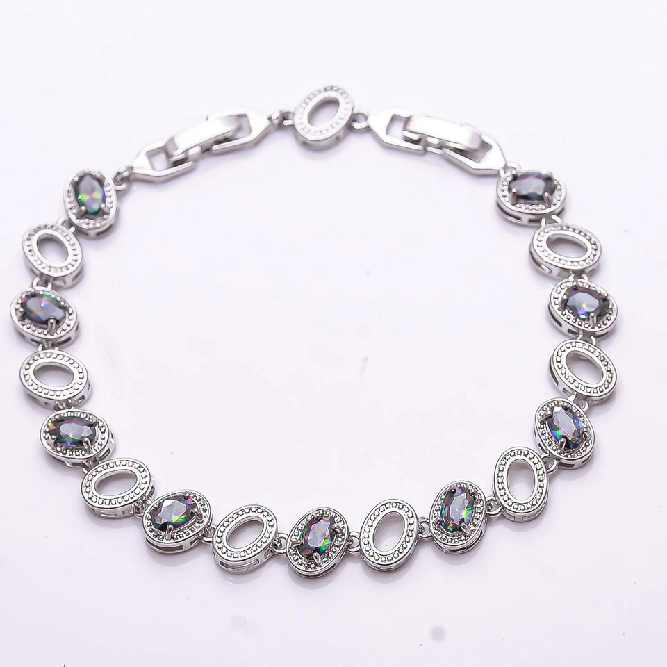 Brazalete Tenis Plata Esterlina 925 Topacio Fuego Místico Arco Iris Azul 7.99" B477406 Foto 2 de 4