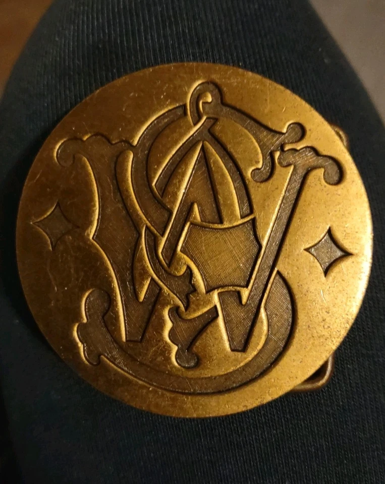 Vintage 1979 Smith & Wesson S&W Logo Belt Buckle – Brass & Bronze Variants - Image 3 of 4