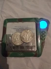 Two 1964 kennedy silver half dollar