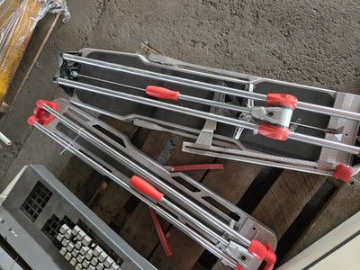 (1) 28'' speed n tile cutter, and (1) Rubi 26'' star max tile cutter