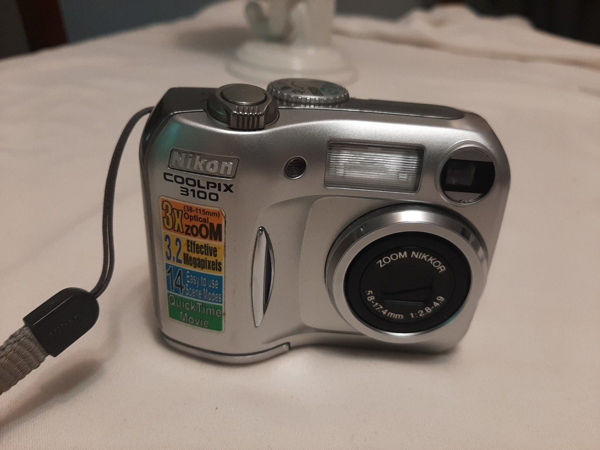 Nikon Nikkor CoolPix 3100 Digital Camera new Batteries case